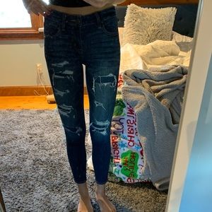 dark wash patched jean